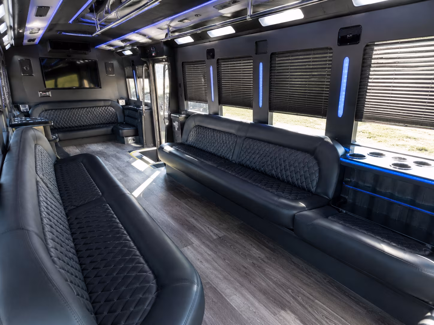 Group beside a Mercedes Sprinter limo in Ontario